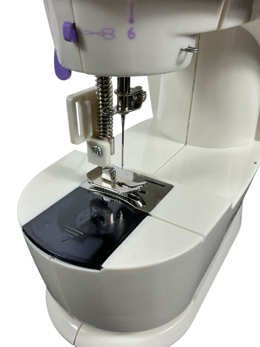 Mini maquina de cocer (MAGIC FLY)