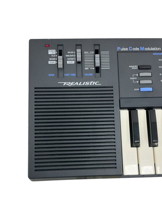 Teclado electrónico  (REALISTIC)