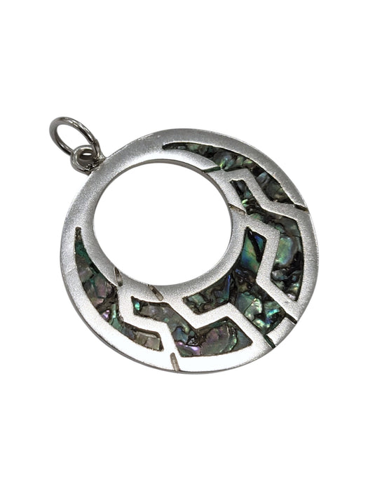 Dije de plata.
