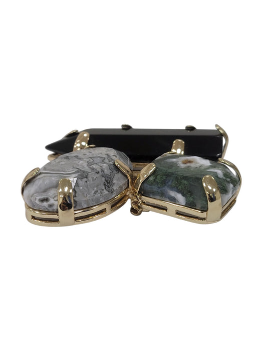 Broche de piedras