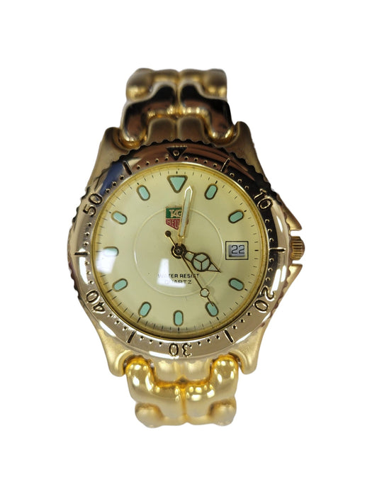 Reloj TAG HEUER dorado con esfera color crema