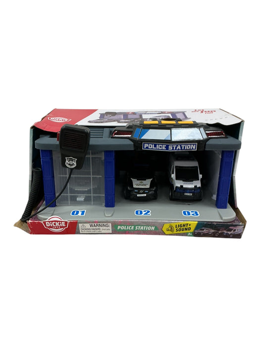 Dickie Toys Police Station - vista frontal en caja con 2 vehículos y micrófono SOS
