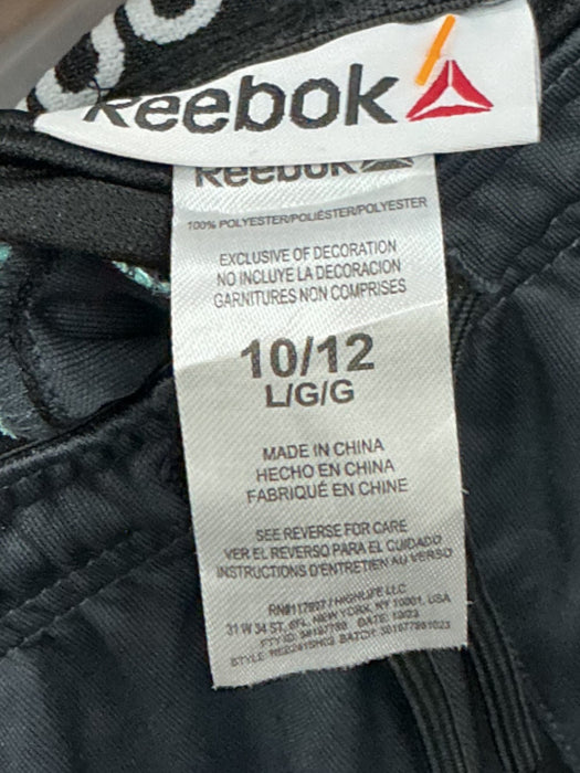 Pantaloneta para niñ@ L (REEBOK)