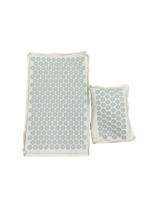 Tapete y almohada de acupresión (UNMERA)