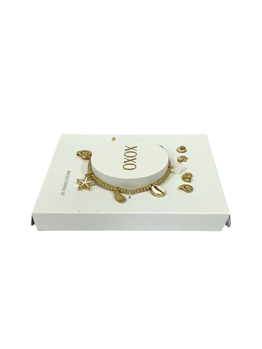 Pulsera y aretes de fantasía (XOXO)